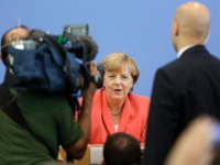 Merkelova za brz povratak migranata u zemlje porekla