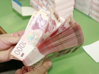 Dinar danas slabiji za 58 para, kurs 103,38