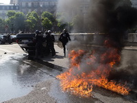 Gori Pariz: Rat policije i taksista
