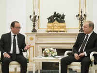 Oland traži veliku koaliciju, Putin spreman za saradnju